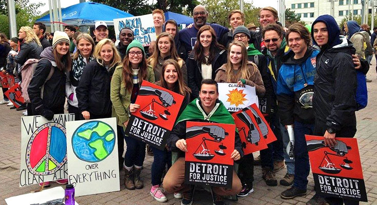 A photo of the Spartan Sierra club gathered at an environmental justice rally in Detroit, Michigan.