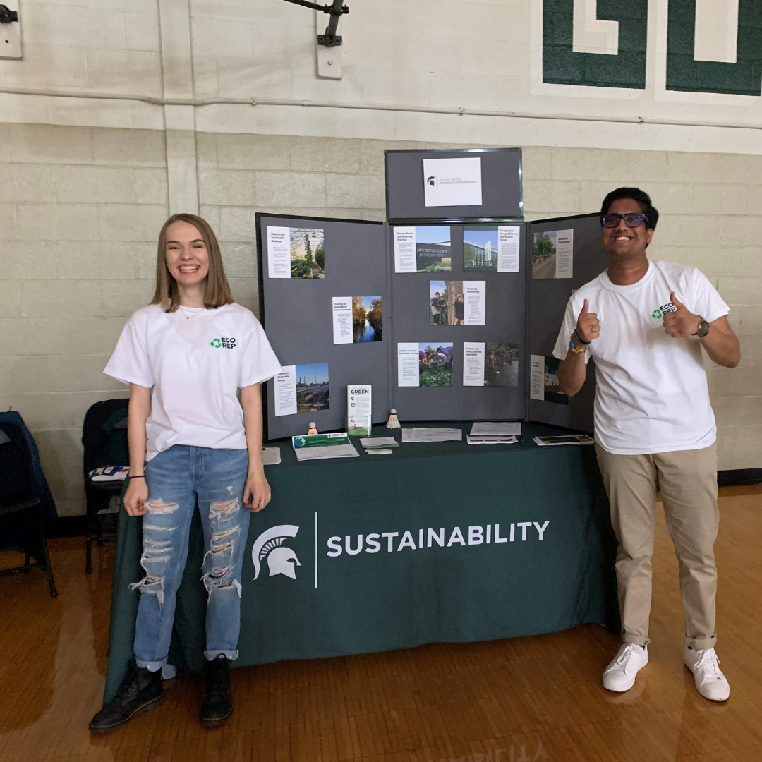 Student Eco Reps doing exhibiting at a table