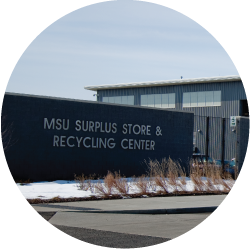 A photo of the exterior of MSU's Surplus Store and Recycling Center in winter. 