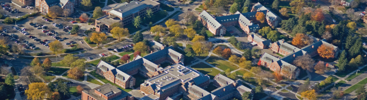 An aerial view photo of the MSU campus buildings in the fall.