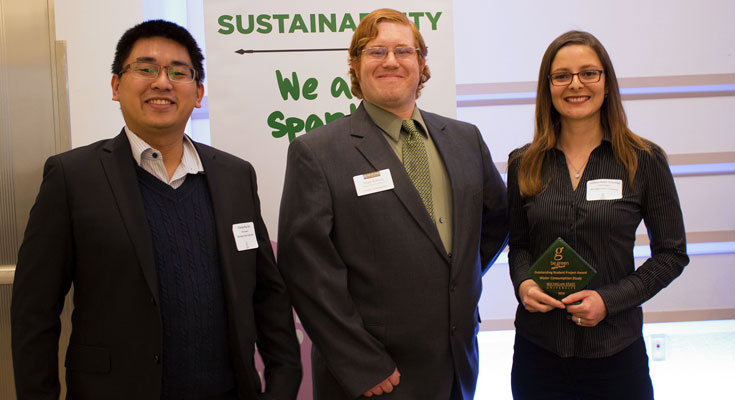 A photo of Cheng-Hua Liu, Melissa Rojas-Downing and Sean Barton holding an award at the 2016 Be Spartan Green Award Gala.