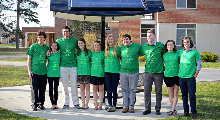 A photo of a student group near the Solar Table on south campus